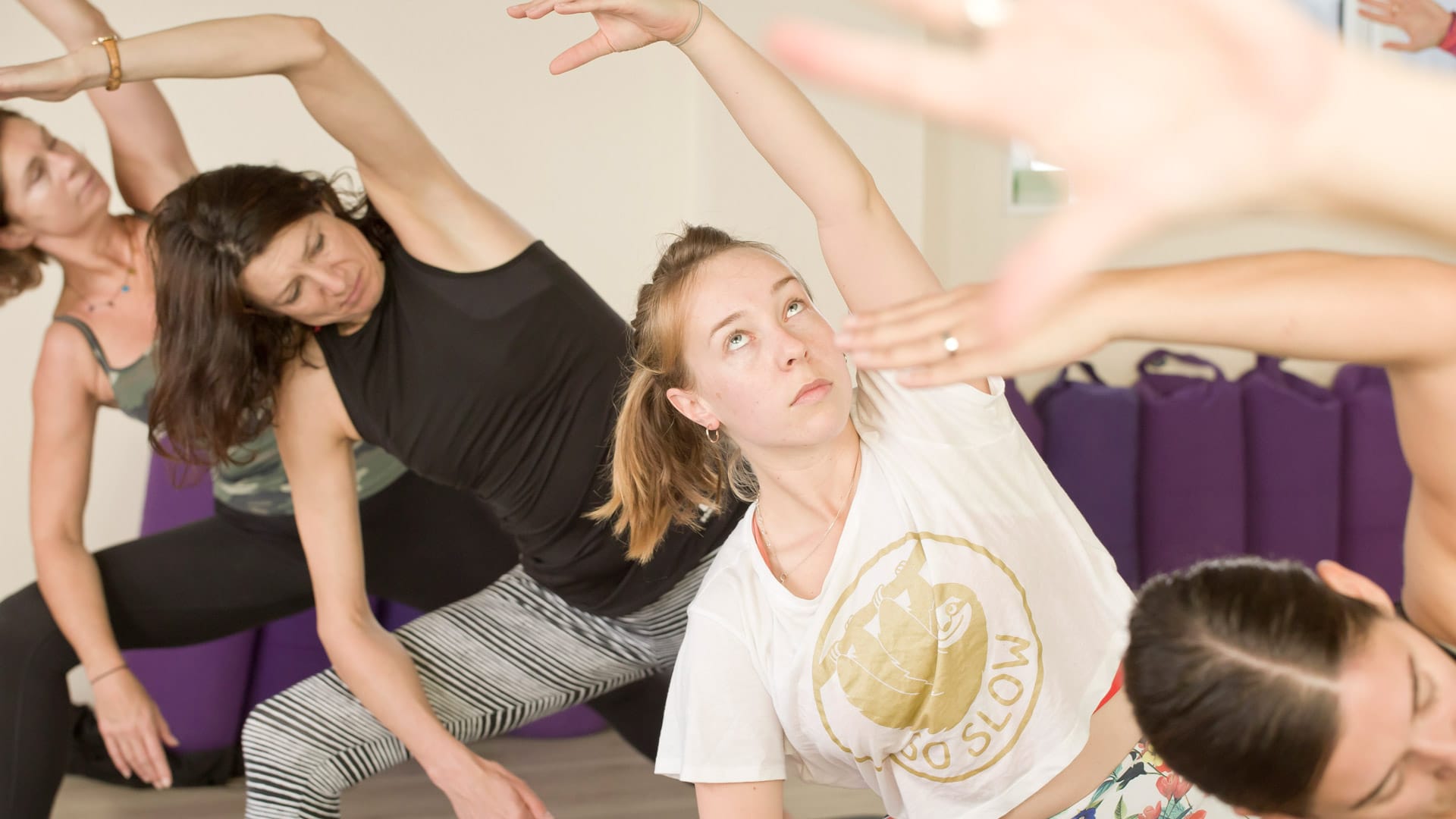 yoga in brighton with yogis practicing side bend 