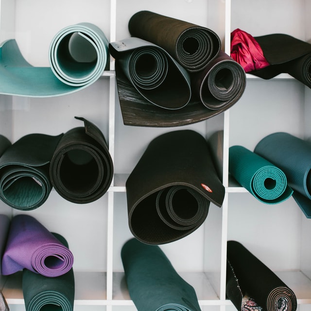 Pilates mats on shelves at our Brighton studio