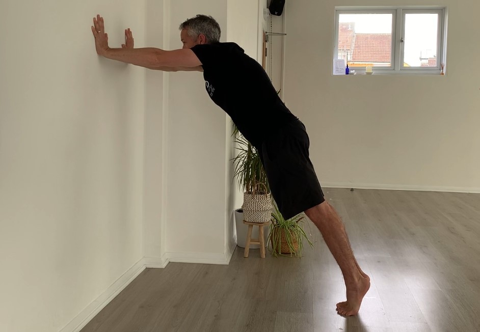 Protect Your Knees With Wall Lean Calf Raises
