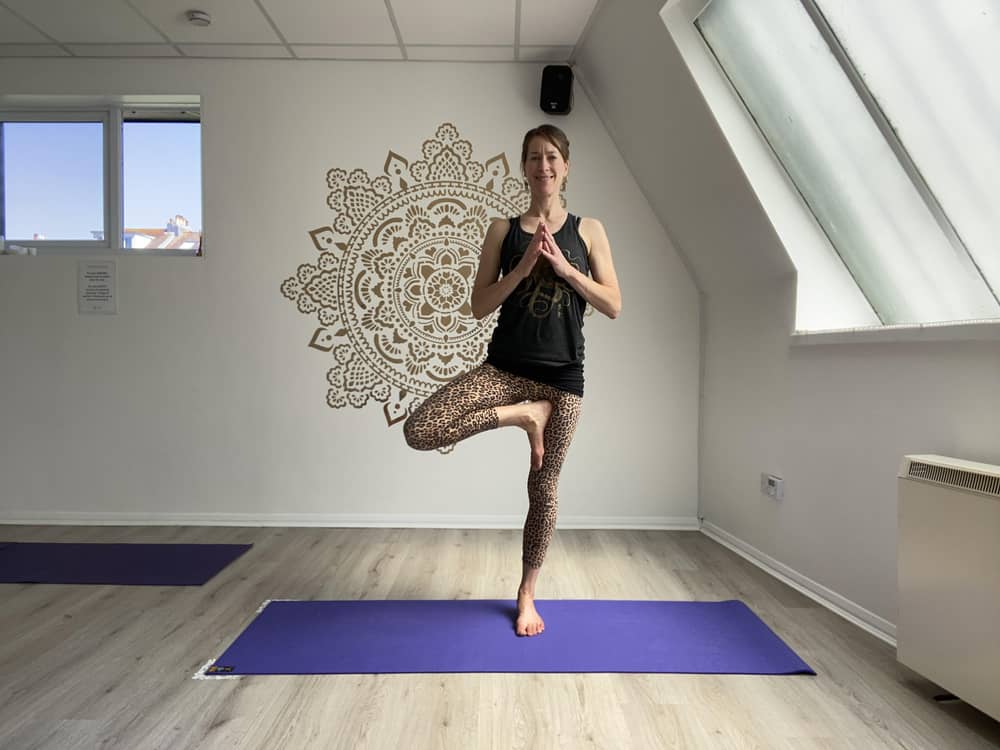 Emma in Tree Pose shot in our Brighton yoga studio